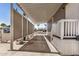 A long driveway with a covered carport at 201 S Greenfield Rd # 254, Mesa, AZ 85206