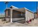 Lovely gray home featuring a covered parking area at 201 S Greenfield Rd # 254, Mesa, AZ 85206