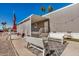Inviting home exterior with a cozy outdoor seating area and desert landscape at 201 S Greenfield Rd # 254, Mesa, AZ 85206