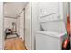 A laundry room with a stacked washer and dryer unit at 201 S Greenfield Rd # 254, Mesa, AZ 85206