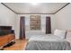 Serene main bedroom with hardwood floors, natural light, and neutral decor at 201 S Greenfield Rd # 254, Mesa, AZ 85206