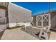 Cozy outdoor area with patio seating, artificial turf, and a shed for storage at 201 S Greenfield Rd # 254, Mesa, AZ 85206