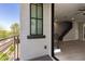 Balcony view leading to open-concept living space with modern staircase at 2090 S Dorsey Ln # 1020, Tempe, AZ 85282