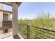 Balcony view showcasing green trees and clear blue skies at 2090 S Dorsey Ln # 1020, Tempe, AZ 85282