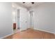 Bedroom featuring a ceiling fan with vinyl wood flooring and attached bathroom at 2090 S Dorsey Ln # 1020, Tempe, AZ 85282