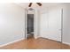 Bedroom featuring a ceiling fan with vinyl wood flooring and closet with sliding doors at 2090 S Dorsey Ln # 1020, Tempe, AZ 85282
