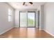 Bedroom showcasing bright walls, walk-out access to a balcony, recessed lighting, and bright floors at 2090 S Dorsey Ln # 1020, Tempe, AZ 85282