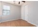 Neutral bedroom features a ceiling fan, a window with blinds and a closet with sliding doors at 2090 S Dorsey Ln # 1020, Tempe, AZ 85282