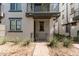 Inviting two-story townhome with desert landscaping, a private balcony, and a covered entry at 2090 S Dorsey Ln # 1020, Tempe, AZ 85282