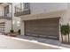 A grey door attached to a one car garage at 2090 S Dorsey Ln # 1020, Tempe, AZ 85282