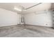 Spacious garage with concrete floors and a water heater at 2090 S Dorsey Ln # 1020, Tempe, AZ 85282