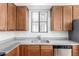 Close up of the kitchen sink, counter tops and dishwasher at 2090 S Dorsey Ln # 1020, Tempe, AZ 85282