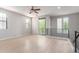 Spacious living room showcasing bright, open space, recessed lighting, a fan, and walk-out access to a balcony at 2090 S Dorsey Ln # 1020, Tempe, AZ 85282