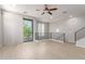 Open-concept living space with large sliding door and wood floors at 2090 S Dorsey Ln # 1020, Tempe, AZ 85282