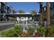 Modern community pool offering lounge seating with green landscaping at 2090 S Dorsey Ln # 1020, Tempe, AZ 85282
