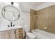 Modern bathroom with tile shower and flooring, modern vanity, and contemporary finishes at 2138 W Beaubien Dr, Phoenix, AZ 85027