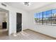 Bright and airy bedroom with tile flooring, large window, and neutral colors at 2138 W Beaubien Dr, Phoenix, AZ 85027