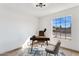 Cozy home office with natural light, sleek furniture, and a calming workspace at 2138 W Beaubien Dr, Phoenix, AZ 85027