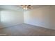 Expansive bedroom shows neutral tones, plush carpeting, and ample natural light at 2440 N 22Nd Ave, Phoenix, AZ 85009