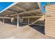 Covered carport with ample parking space next to well-maintained building at 2440 N 22Nd Ave, Phoenix, AZ 85009
