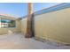 Secluded back patio offers tranquil setting with a mature palm tree at 2440 N 22Nd Ave, Phoenix, AZ 85009