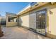 Private patio features secure sliding glass door and decorative wrought iron at 2440 N 22Nd Ave, Phoenix, AZ 85009