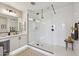 Modern bathroom with a glass-enclosed shower, stylish tiling, and contemporary fixtures at 26217 N 19Th Ln, Phoenix, AZ 85085