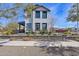 Beautiful two-story home featuring a well-manicured front yard, dark trim, and lovely landscaping at 26217 N 19Th Ln, Phoenix, AZ 85085