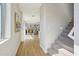 Entryway with staircase and view of the kitchen, dining, and living area at 26217 N 19Th Ln, Phoenix, AZ 85085