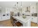 Bright kitchen featuring stainless steel appliances, a center island, and ample counter space at 26217 N 19Th Ln, Phoenix, AZ 85085