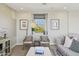 Inviting living room featuring comfortable seating, neutral palette, and modern decorative accents at 26217 N 19Th Ln, Phoenix, AZ 85085