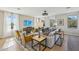Bright living room featuring stylish furniture, neutral decor, and large windows with natural light at 26217 N 19Th Ln, Phoenix, AZ 85085