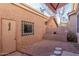Relaxing backyard featuring a block wall, desert landscaping, and stepping stones leading to outdoor living spaces at 2875 W Highland St # 1102, Chandler, AZ 85224