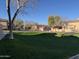 Well-maintained townhomes with manicured landscaping and lush green common areas at 2875 W Highland St # 1102, Chandler, AZ 85224