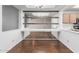 Bright dining area with wood floors and views into the kitchen at 2875 W Highland St # 1102, Chandler, AZ 85224