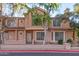 Charming townhome featuring a red-tile roof, neutral stucco, a two-story layout and ample window space at 2875 W Highland St # 1102, Chandler, AZ 85224