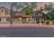 Charming townhome featuring a red-tile roof, neutral stucco, a two-story layout and ample window space at 2875 W Highland St # 1102, Chandler, AZ 85224