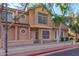 Charming two-story townhome featuring a neutral stucco, a red-tile roof, and ample window space at 2875 W Highland St # 1102, Chandler, AZ 85224