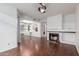 Bright living room features a fireplace, wood floors and an open floorplan at 2875 W Highland St # 1102, Chandler, AZ 85224