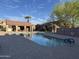 Community pool features a covered seating area and well-maintained, clear blue water for relaxation and recreation at 2875 W Highland St # 1102, Chandler, AZ 85224