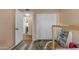Charming bedroom with a view through to another room, featuring gray wood flooring and a closet at 2966 S Country Club Way, Tempe, AZ 85282