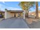 Inviting home exterior with covered parking, desert landscaping, and a welcoming entrance at 2966 S Country Club Way, Tempe, AZ 85282