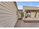 Welcoming entrance with a decorative wreath, terracotta roof detail, and well-maintained landscaping at 2966 S Country Club Way, Tempe, AZ 85282