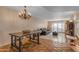 Open living area showcases stylish chandelier, and an open layout perfect for entertaining or relaxation at 2966 S Country Club Way, Tempe, AZ 85282