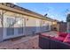 Private patio with seating area and multiple access points into the home at 2966 S Country Club Way, Tempe, AZ 85282