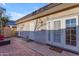 Private patio area featuring multiple access points to the home, creating a seamless indoor-outdoor living experience at 2966 S Country Club Way, Tempe, AZ 85282