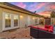 Outdoor patio featuring outdoor seating, access to the home, and an evening sky at 2966 S Country Club Way, Tempe, AZ 85282