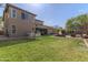 Large backyard with pool, hot tub, and lush green lawn at 3062 E Cullumber St, Gilbert, AZ 85234