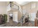 Grand foyer with high ceilings, staircase, and views into the dining area at 3062 E Cullumber St, Gilbert, AZ 85234