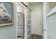 Pantry boasts a stainless steel refrigerator, barn door, and additional storage at 3062 E Cullumber St, Gilbert, AZ 85234